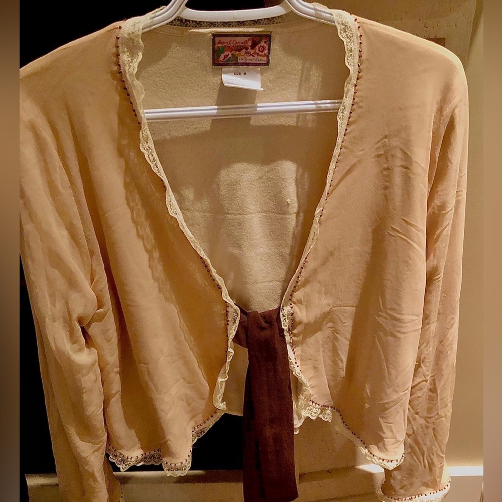 Beautiful top with lace and bead finish.